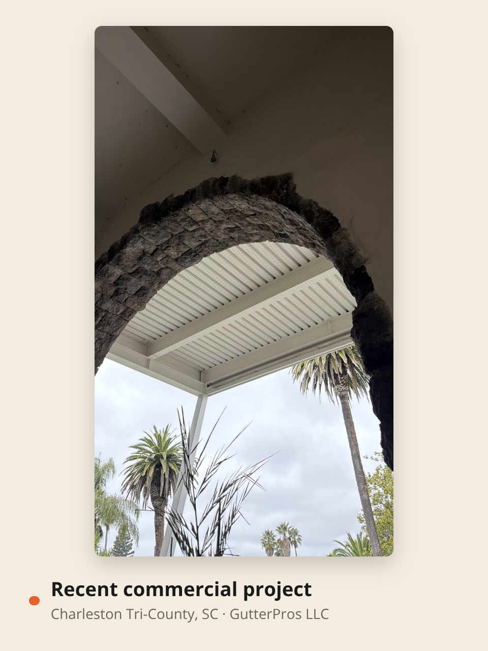 Recent GutterPros LLC commercial project in the Charleston Tri-County: a custom patio cover and roof structure finished with seamless aluminum gutter and downspout work.